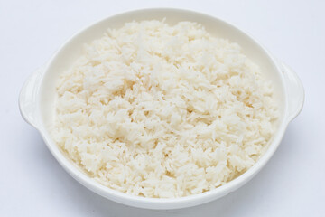 Dish of rice on white background.