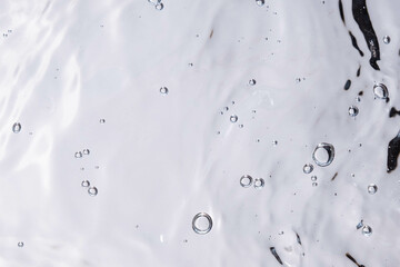 Underwater bubble texture on white background. Water with bubbles. Air bubbles underwater