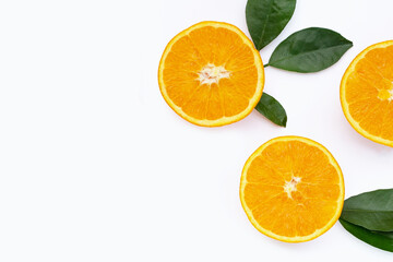 Fototapeta na wymiar Orange fruit with green leaves on white background.