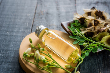 Moringa Oil and seeds, The seeds of the Moringa tree are pressed oil known as Ben Oil yellow