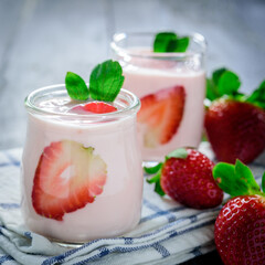 Healthy food of yogurt, Strawberry Yogurt,yogurt with fresh strawberry, wood background