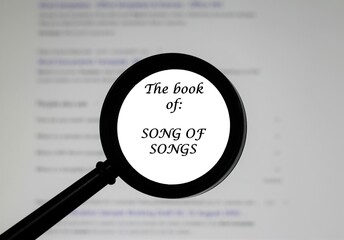The Book of Song of Songs from the Holy Bible, illustrated inside a magnifying class, zoomed in.	