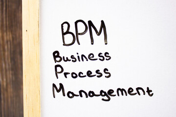 BPM. Business Process Management - text concept on white board abbreviation.
