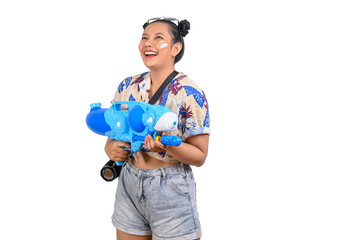 Portrait cute woman in Songkran festival with water gun