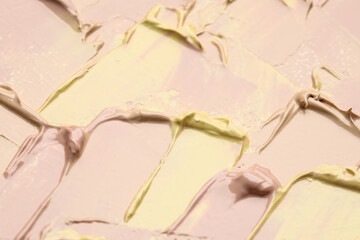 Beautiful strokes of colorful oil paints as background, closeup