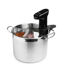 Thermal immersion circulator and meat in pot on white background. Vacuum packing for sous vide cooking
