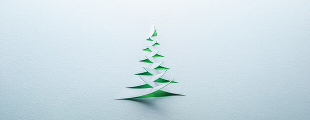Christmas tree cut from blue and green textured paper