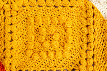 crochet pattern with bubble stich yellow colored