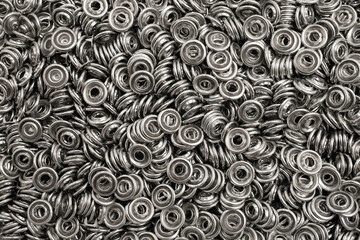 Metal eyelets for sewing. Grommets for clothes.