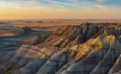 Sunrise Over The White River Valley and The Eroded Cliffs of Panorama Point, Badlands National...