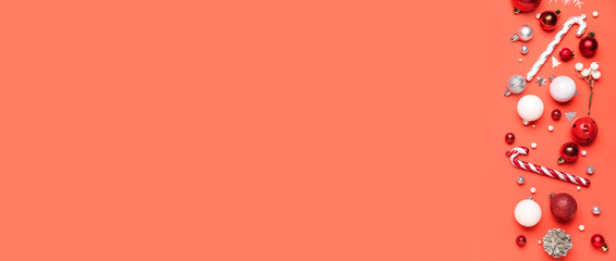 Banner with Christmas decorations on red background with space for text