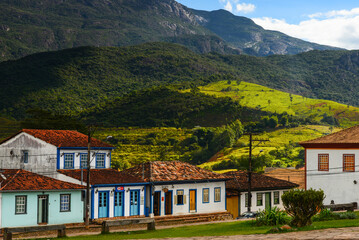 Fototapeta na wymiar The picturesque main square of small Catas Altas colonial mining town surrounded by the mountains of the Serra do Caraça range, Minas Gerais state, Brazil