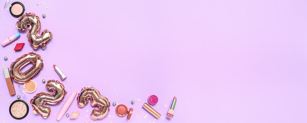 Balloons in shape of figure 2023 with makeup cosmetics and festive decorations on lilac background with space for text