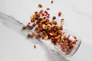 the nut mixture is scattered from a glass jar