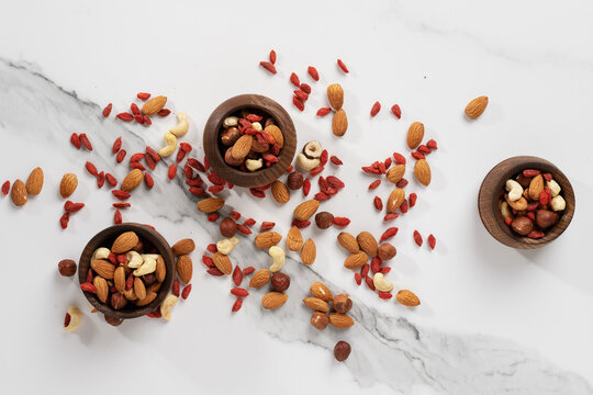 nut mixture in wooden bowls