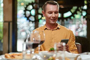 Happy Man Texting Girlfriend