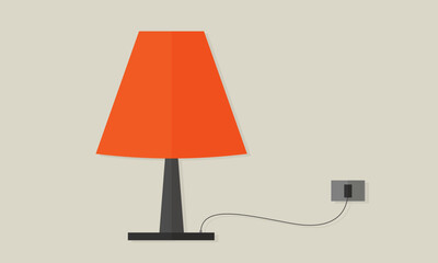 Orange table lamp Plugged in the power on Light Brown Background