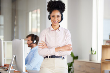 Fototapeta premium Portrait of black woman, call center and customer service employee working in office of remote online telemarketing business. Proud crm consultant, female digital support and telecommunication worker