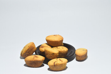 Fototapeta na wymiar Traditional sponge cake. These cookies are popular during Eid al-Fitr in Indonesia on a white background