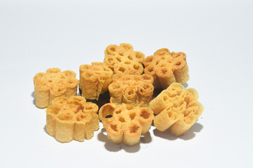 Honeycomb cake is also known as Kuih Loyang. These cookies are popular during Chinese New Year and Hari Raya in Malaysia and Singapore on a white background