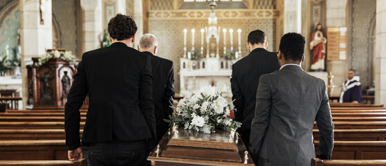 Funeral, church and group carry coffin in service, death or sermon for burial with support. Friends, family or pallbearers with casket for respect, help or sorrow in mourning, worship or god religion