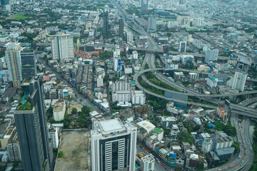 Bangkok, Thailand  : City scape of building. business area, higher tower with highway transportation in BKK, accommodations, office building. It bathed in warm   background.