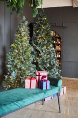 Room decorated for Christmas or new year. The interior of the room with a Christmas tree and decorations for the holiday.