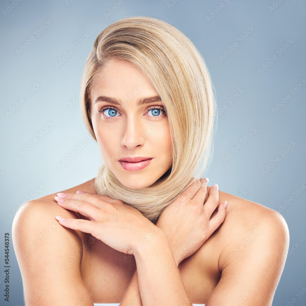 Wall mural beauty, blonde hair and portrait of woman in studio on blue background for hair care, hair products 