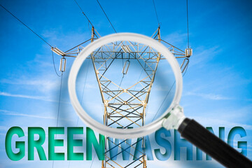Alert to Greenwashing about electricity business - concept with text against an electricity pylon...