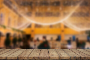Empty Wood Table With Blur coloured lights Background.