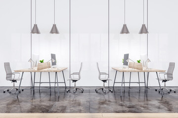 Side view on stylish and cozy open space office with modern computers on wooden work tables on dark marble floor with light wall background. 3D rendering