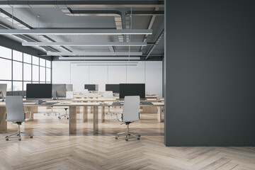 Modern concrete coworking office interior with wooden flooring, window and city view, empty mock up place on wall, furniture and equipment. 3D Rendering.