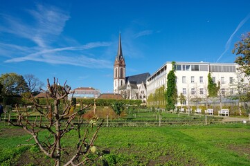 Beautiful park, Herrngarten, in Germany, Darmstadt with a beautiful church in the background. Picture taken in November.