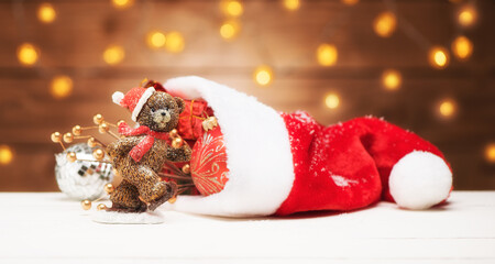 Funny Bear and presents with decorations.  Christmas or New Year Banner. Winter holiday concept
