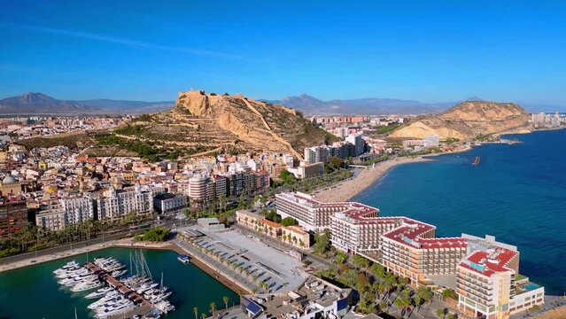 4k drone flight over Alicante, marina, beach, hotels and castillo de santa barbara. The cities main attractions are in the video.
