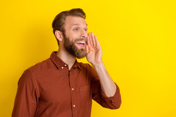 Photo of handsome positive funny man blond beard wear burgundy shirt arm mouth look empty space...