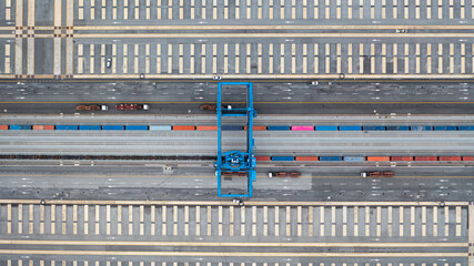 Aerial view of shipping container rail terminal, Train wagon cargo container for shipping, Aerial view of container terminal on railway.