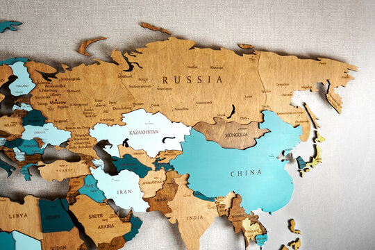 Continent Eurasia On The Political Map. Wooden World Map On The Wall, Russia, Kazakhstan, China, Mongolia, Iran