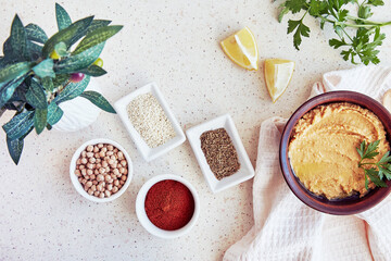 Traditional hummus spread - cooked, smashed chickpeas, tahini, olive oil, garlic, lemon juice. Top...