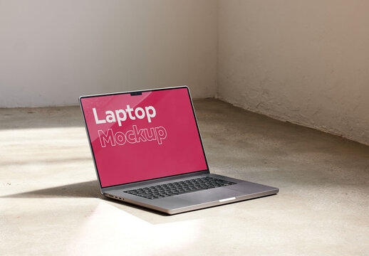 Modern Laptop Mockup on a Concrete Floor With Sun Light