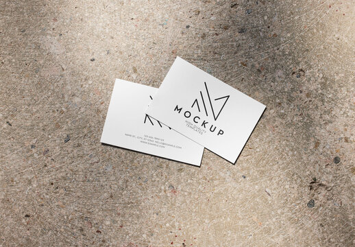 Two Horizontal Business Card Mockup on a Concrete Background With Sun Light