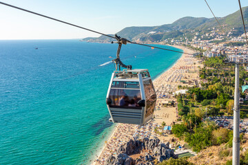 Fototapeta premium Cable car to fortress over Cleopatra beach in Alanya, Turkey