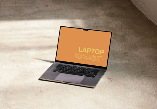 Silver Laptop Mockup on a Floor Studio