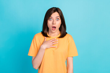 Photo of shocked young lady open mouth arm touch chest cant believe isolated on blue color...