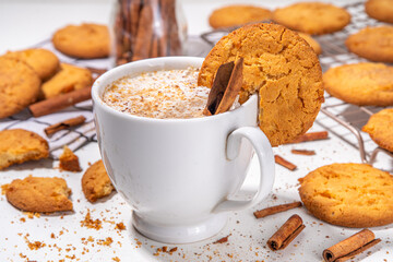 Snickerdoodle latte coffee, with whipped cream, spices, cinnamon and Snickerdoodle cookies crumble topping