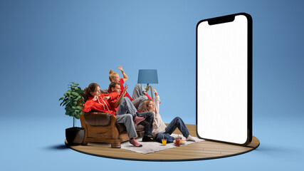 Expressive young people, emotional friends watching horror movie together over blue background. Youth sitting on sofa in front of huge 3D model of cellphone screen