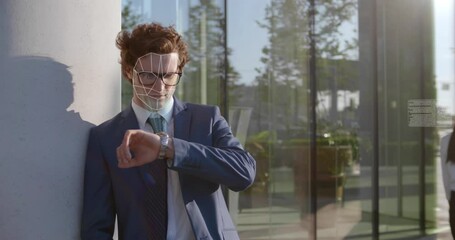 Businessman stand outdoors using smartatch with face scanning hologram - Powered by Adobe