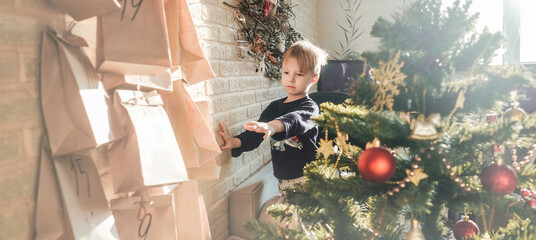 Child stretches for advent calendar with small gifts