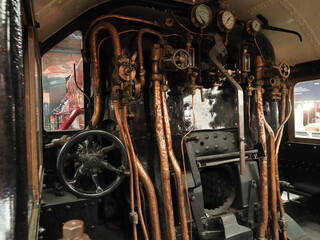 The footplate of a steam locomotive in the National Railway Museum at York in the UK