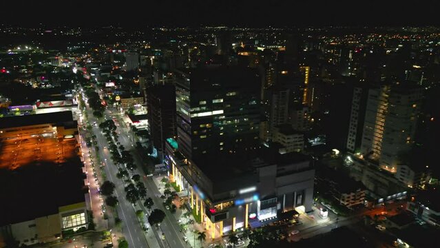 Aerial view Blue Mall and its surroundings at night in Santo Domingo, Dominican